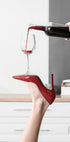 Pouring Red Wine Heels Poster - Posterbox.no