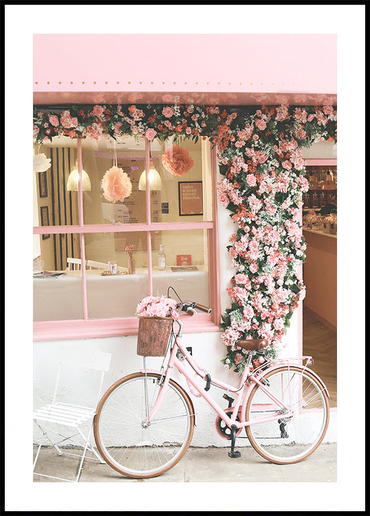 Ein rosa Fahrrad in voller Blüte Poster