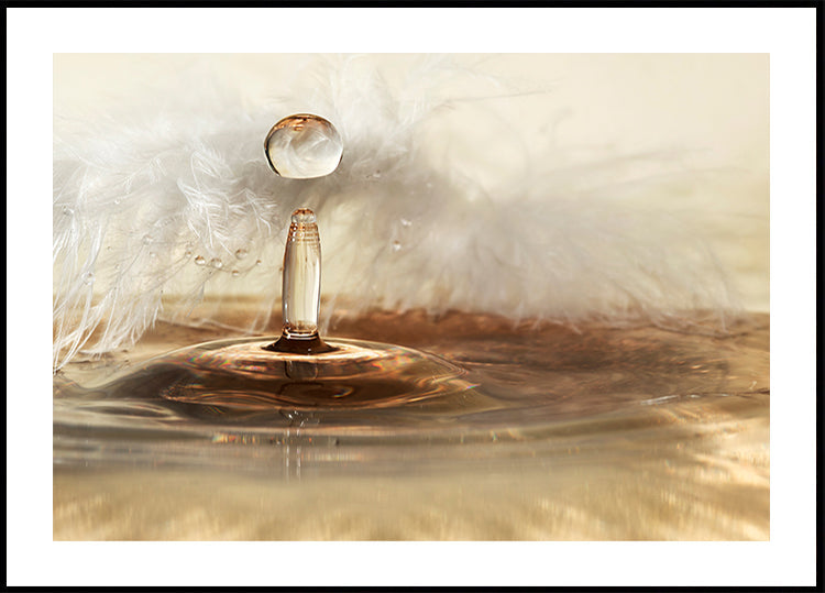 Goldene Federtropfen