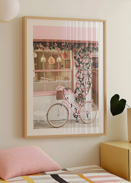 Ein rosa Fahrrad in voller Blüte Poster